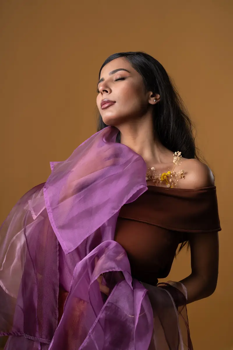Petal Remains BUFT Graduation Couture Collection 2026 by Bangladeshi fashion designer Narin Juhi — layered organza in dusty rose, violet, cocoa and ivory with ruffles and dried-flower embroidery, photo 3 of 36
