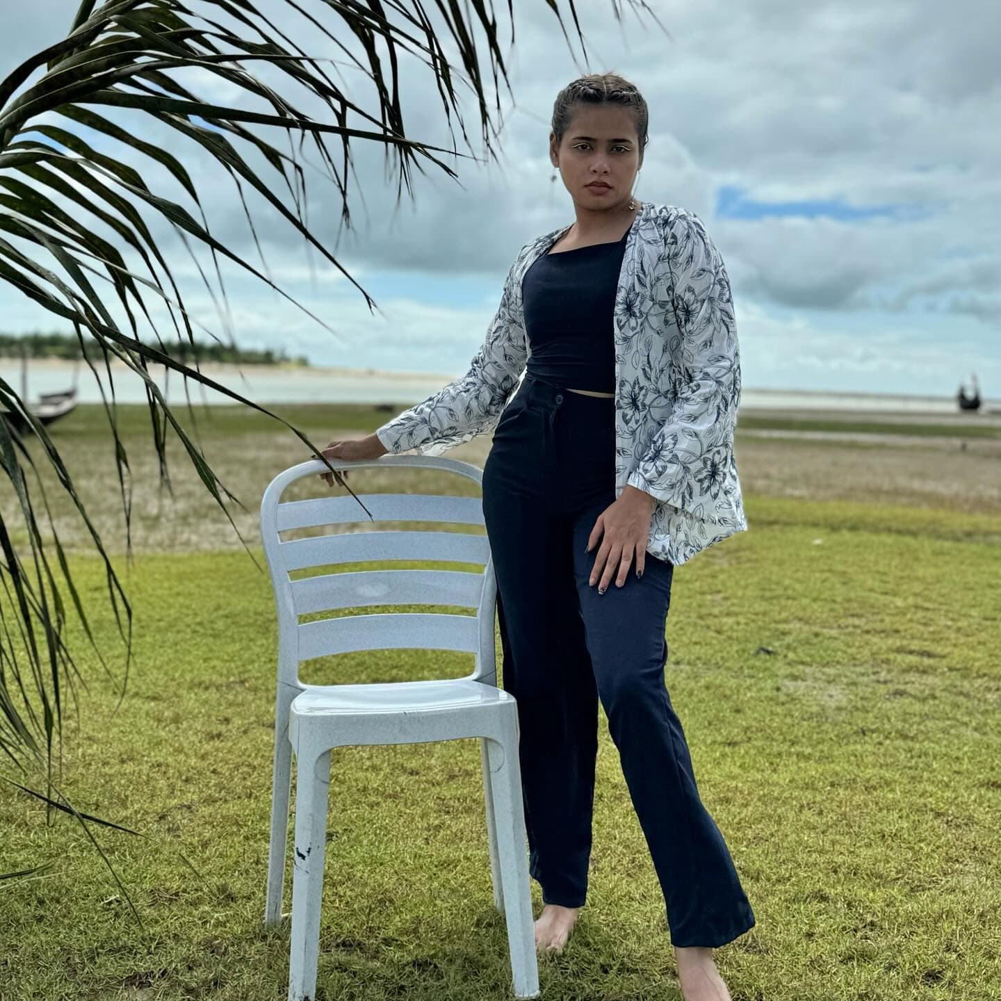 Ivory and grey print overshirt worn open over navy