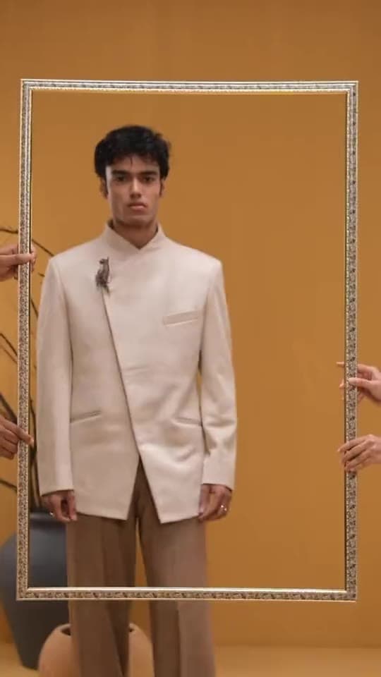 Petal Remains BUFT Graduation Couture Collection 2026 film by Bangladeshi fashion designer Narin Juhi — models in ivory tailoring and layered organza with dried flowers against a mustard backdrop.